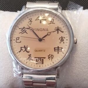 NEW/IN PLASTIC WRAP STAINLESS STEEL MANS WATCH BOUGHT IN TAIWAN 2020. NEVER USED